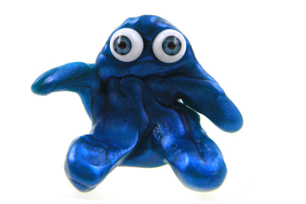 istock plasticine figure with blue eyes isolated 1077182574
