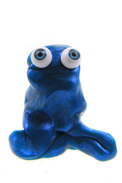 istock plasticine figure with blue eyes isolated 1077182576
