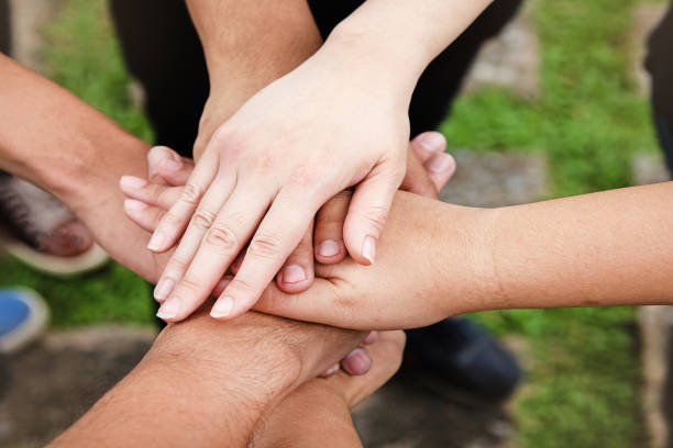 istock The human hand is touching together,teamwork concept 1077188814