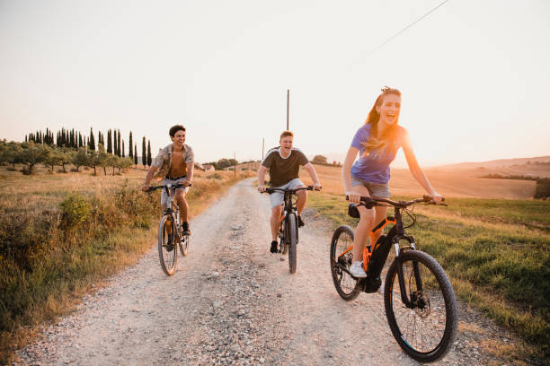 istock Young People Biking in Italy 1077189234