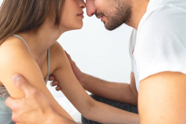 istock The man and a woman on the white background 1077190656