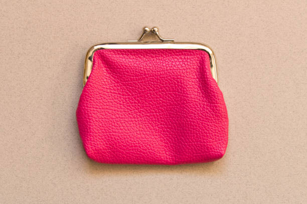 istock Pink wallet on grey background . Close up. Top view 1077190744