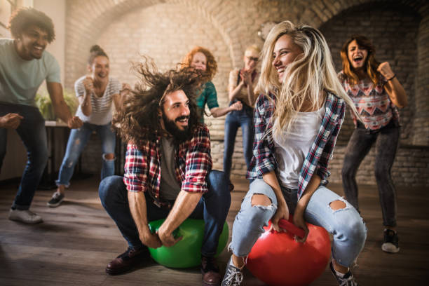 istock Space hopper game at casual office! 1077196588