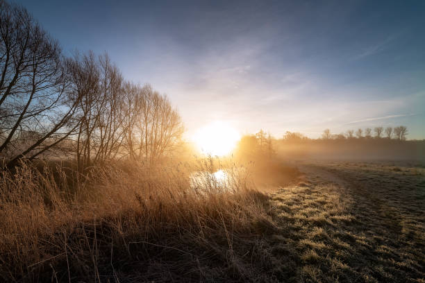 istock Sunrise breaking clear of the hills 1077197846