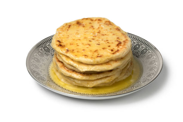 istock Stack of traditional Moroccan meloui pancakes topped with butter 1077200766