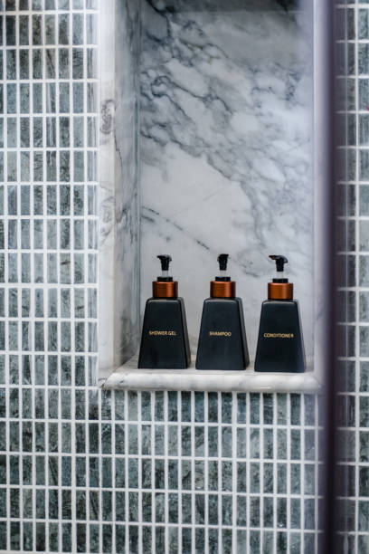 istock Bathroom toiletries on marble shelf 1077203000