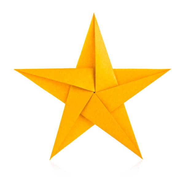 estrella de oro de origami - origami fotografías e imágenes de stock