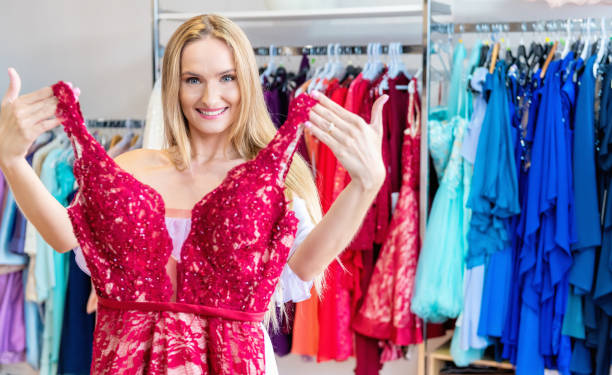 istock Ecstatic woman at clothing store 1077203744