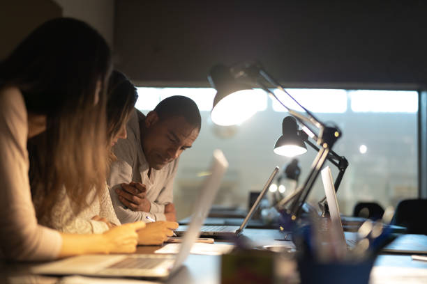 istock Business meeting at night 1077204108