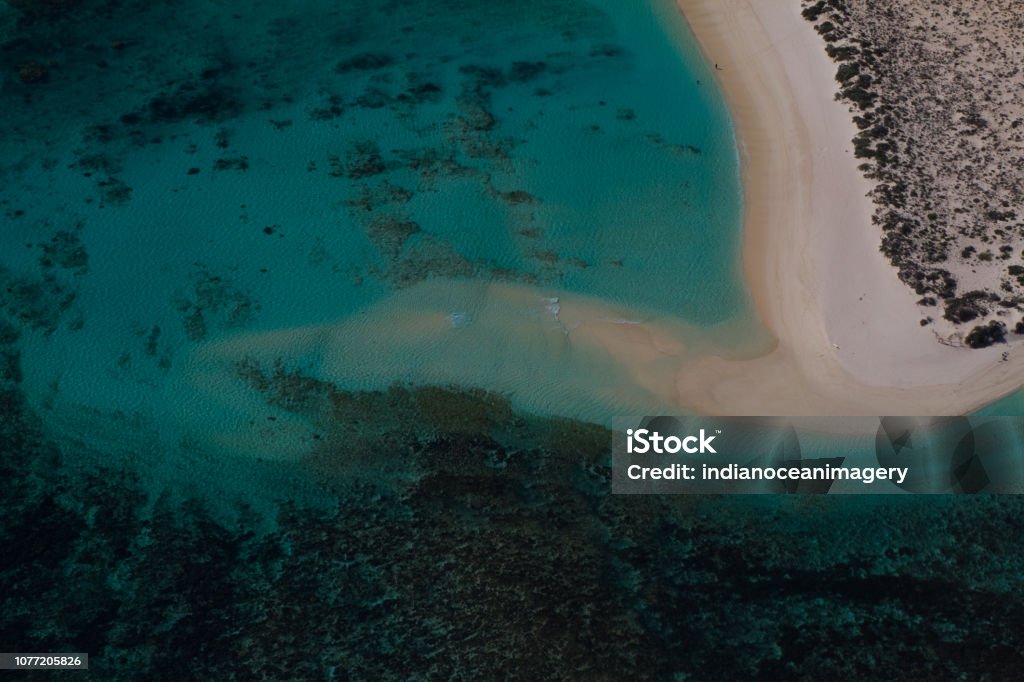 Aerial view of sandspit and sand movements around coral reef at the Ningaloo Marine Park Turquoise bay Ningaloo Reef Stock Photo