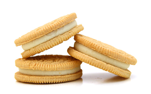 A neat stack of vanilla sandwich cookies