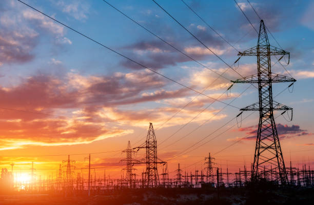istock High-voltage power lines. Electricity distribution station. high voltage electric transmission tower. Distribution electric substation with power lines and transformers 1077212344