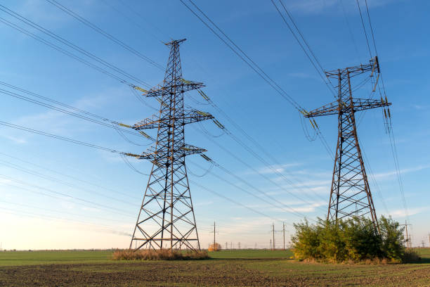 istock High-voltage power lines. Electricity distribution station. high voltage electric transmission tower. Distribution electric substation with power lines and transformers 1077212350