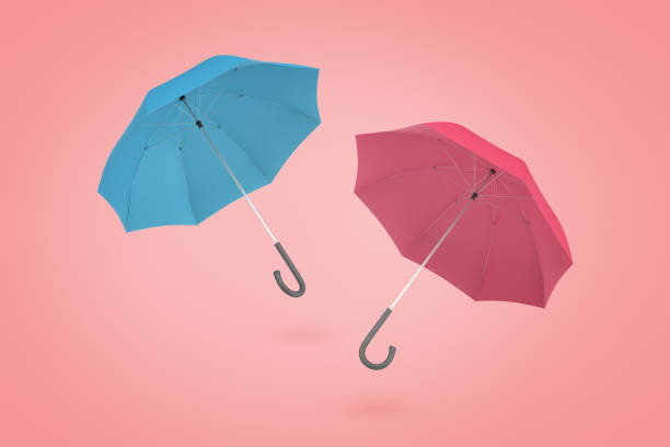 istock 3d rendering of pink and blue umbrellas opened up on light pink background 1077218616