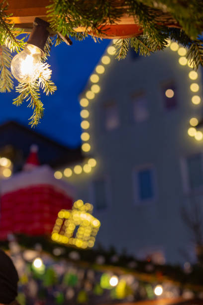 istock christmas market stall lights and details 1077221090