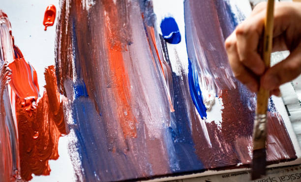 istock Canvas being painted with Acrylic 1077225440