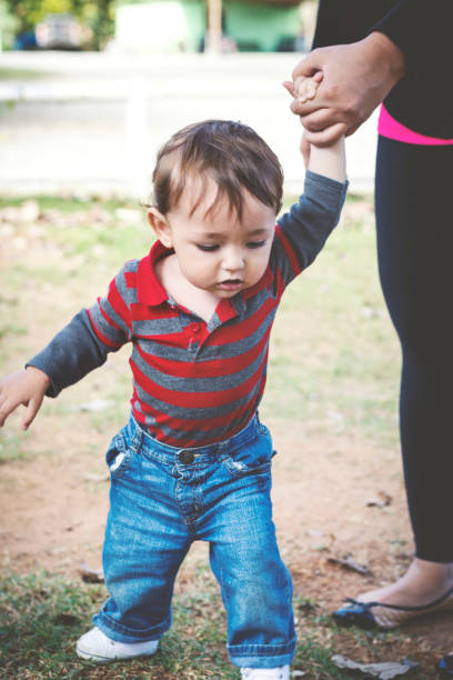 istock Little boy playing in a public park 1077230642