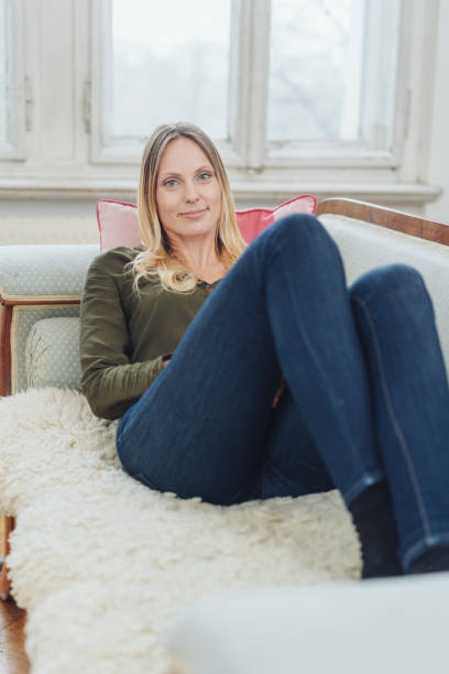 istock Attractive woman spending a relaxing day at home 1077235258