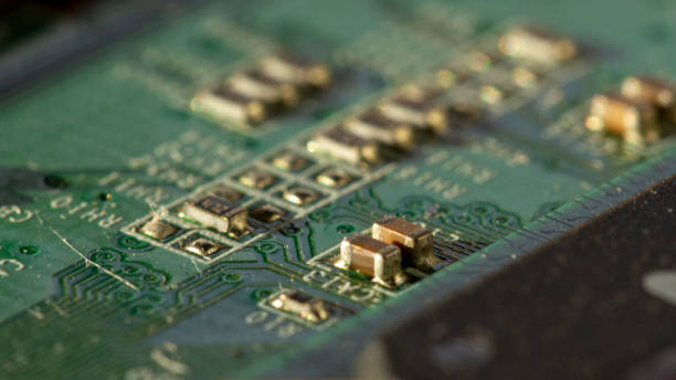 istock Macro picture of green printed circuit board - PCB 1077235596