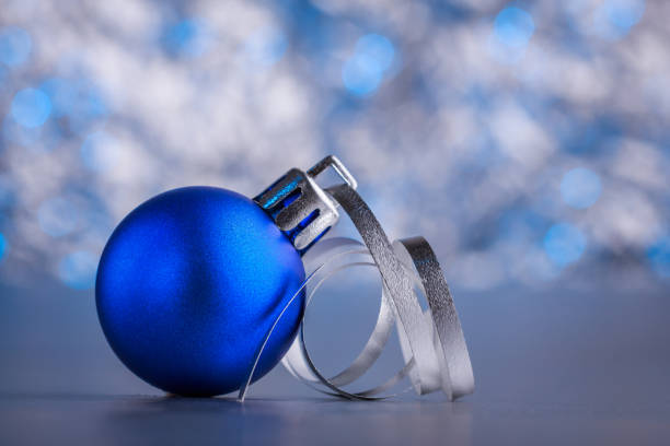 istock Christmas composition of Christmas tree toys on a blurred silver background 1077240736