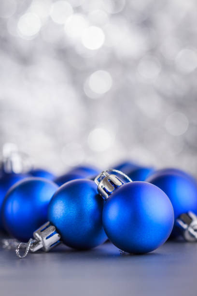 istock Christmas composition of Christmas tree toys on a blurred silver background 1077241070