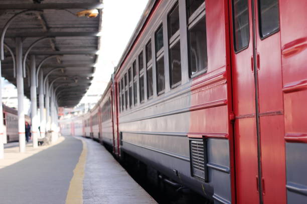 istock A passenger train stands in the station with no passengers. 1077241454