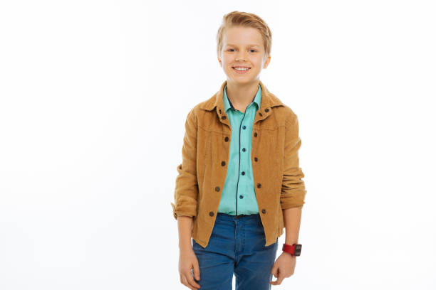 istock Cute cheerful nice boy smiling to you 1077248670