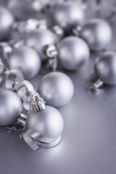 istock Christmas composition of Christmas tree toys on a blurred silver background 1077248936