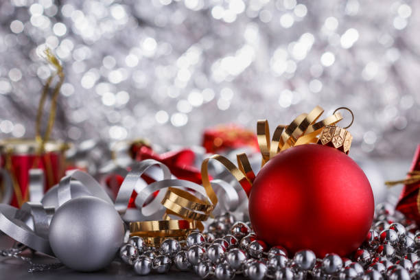 istock Christmas composition of Christmas tree toys on a blurred silver background 1077249862