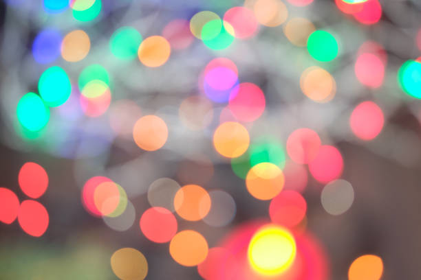 istock Defocused abstract multicolored bokeh lights background.Magic explosion star with particles 1077257354