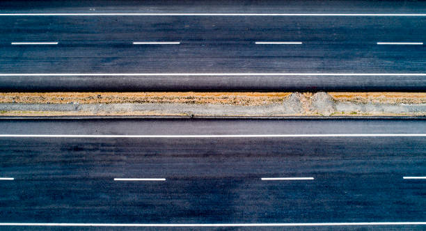 istock Aerial view of empty road - highway 1077257646
