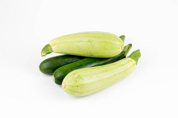 istock Green fresh zucchini on the white background. Turkish zucchini. 1077257912