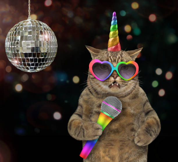 istock Cat unicorn singing a song at the stage 1077259718
