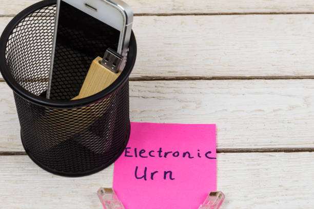 istock Electronic equipments in trash can, Electronic waste concept 1077265084