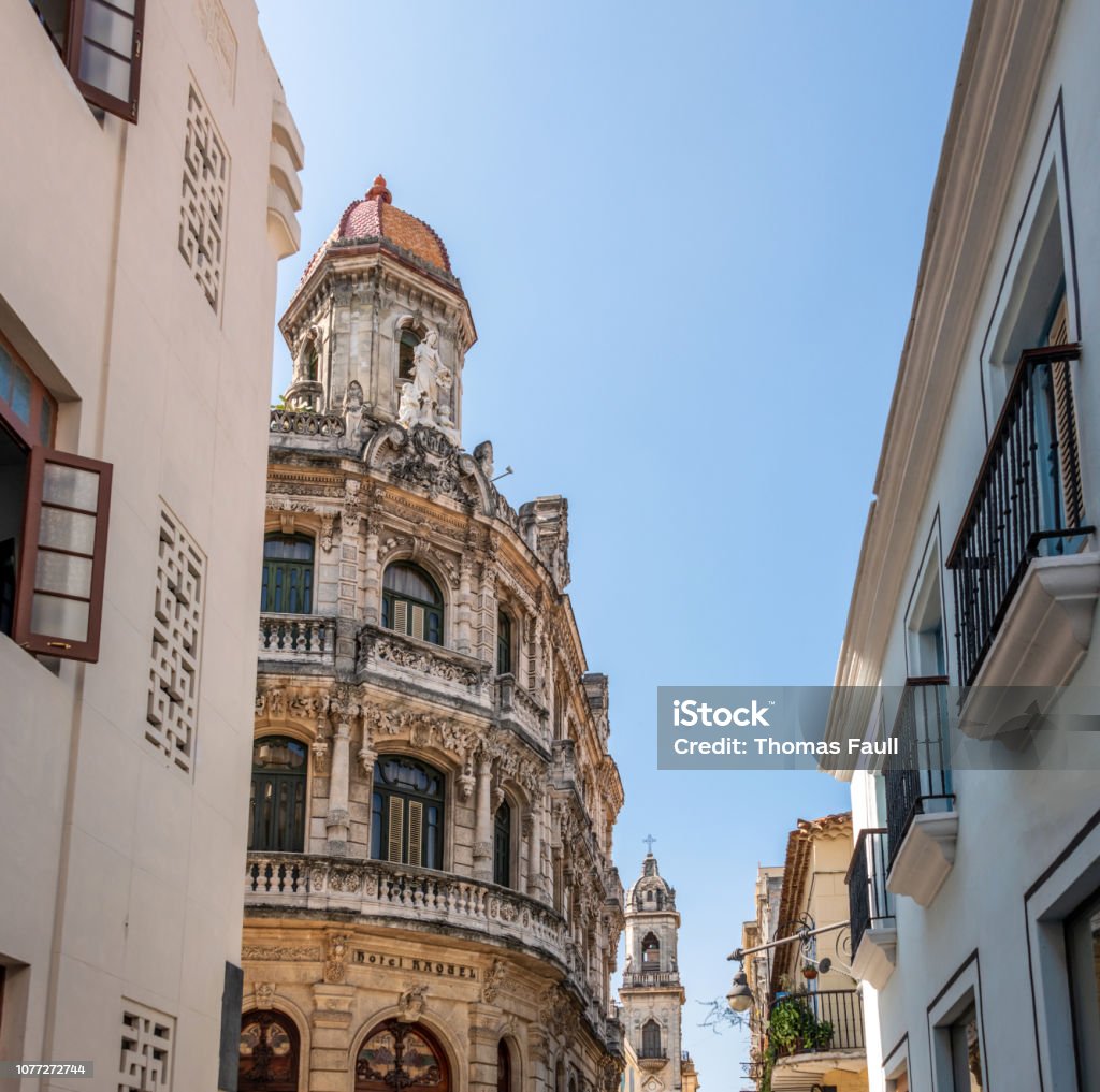 View down street of old buildings in old town Havana, Cuba Architectural Feature Stock Photo