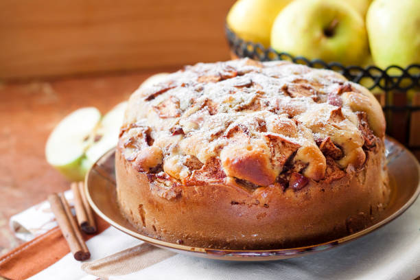 istock Homemade apple pie with cinnamon on the plate 1077277624