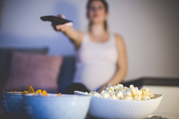 istock Movie night at home with some snacks 1077277698