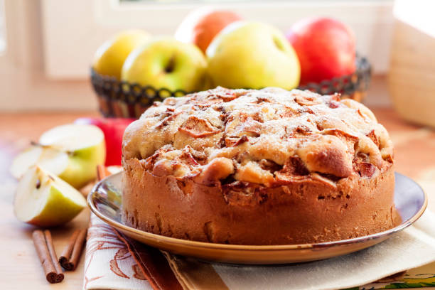 istock Homemade apple pie with cinnamon on the plate 1077280456