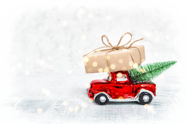 istock VIntage car gift box Christmas tree lights decoration 1077286362