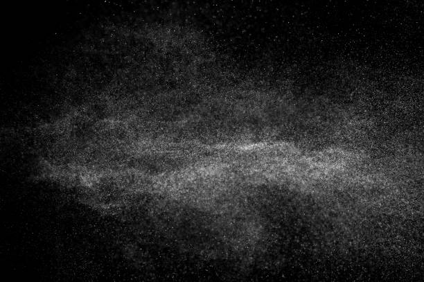 istock abstract splashes of water on a black background. 1077290056