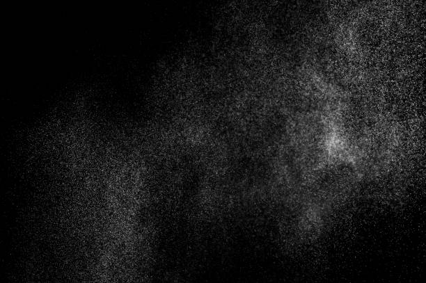 istock abstract splashes of water on a black background. 1077290074