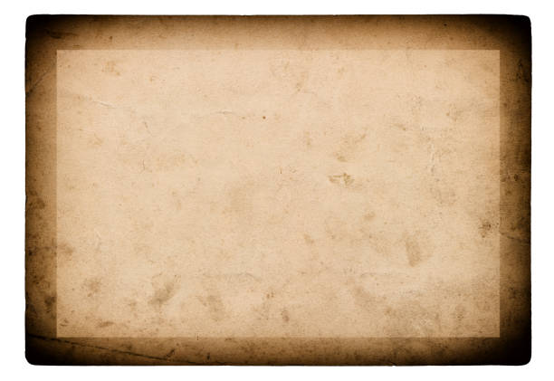 istock Used paper vintage photo frame white background 1077296514