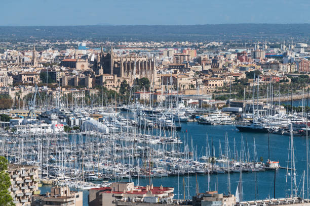 Panorama of Palma de Mallorca viewed from Castell de Bellver castle. Yacht port can be seen in the waterfront. And in the distance the Gothic Roman Catholic cathedral of Santa Maria of Palma (La Seu) can be seen