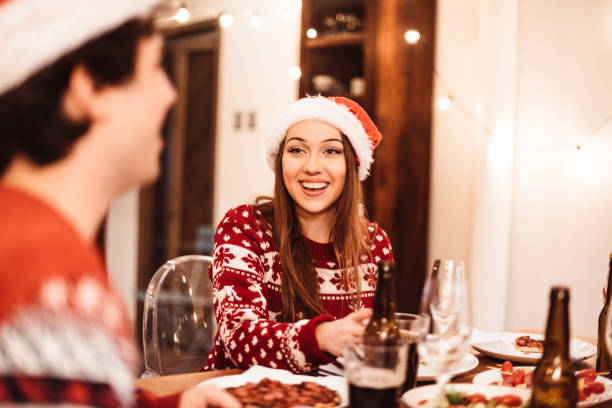 istock sensual woman with a christmas looking drinking champagne 1077302978