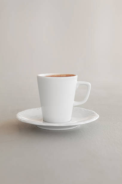 white cup of espresso coffee with clipping path - front view cup saucer white imagens e fotografias de stock