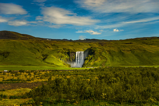 Beautiful, high and huge Skogarfoss waterfall on South Iceland