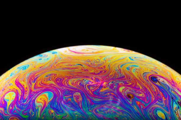 istock Macrophotograph of a colorful soap bubble 1077312324