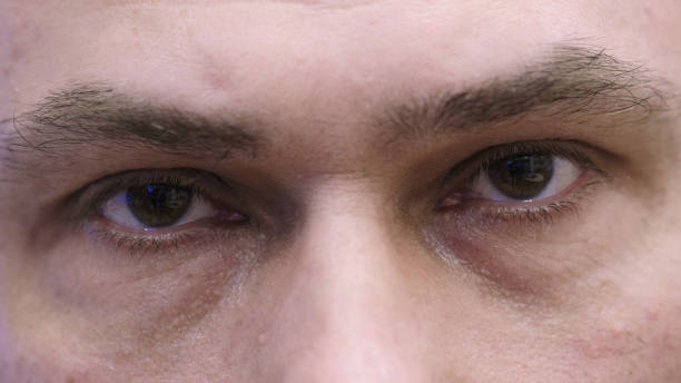 istock Close Up of Middle Age Man Blinking Eyes 1077312824