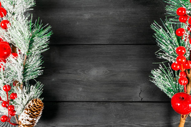 istock Christmas concept. Christmas fir tree with decoration on rustic vintage board. Pine branches. Fir cones. Snow on wood. Xmas and Happy New Year composition. Copy space. Empty space. Top view. Christmas background 1077312884