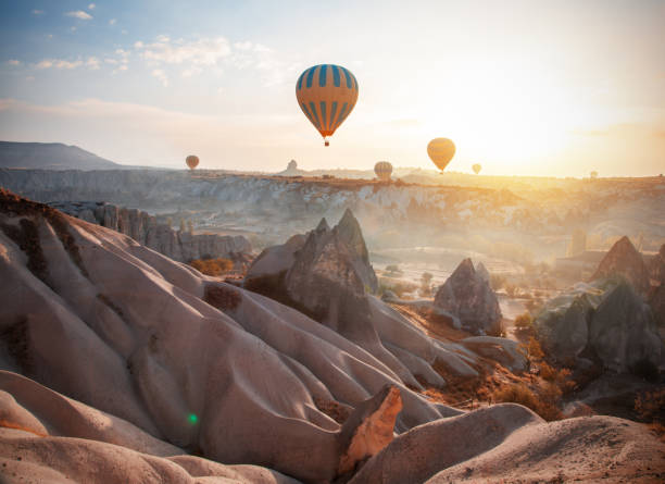 istock Hot air balloon flying over Cappadocia, Turkey 1077318440